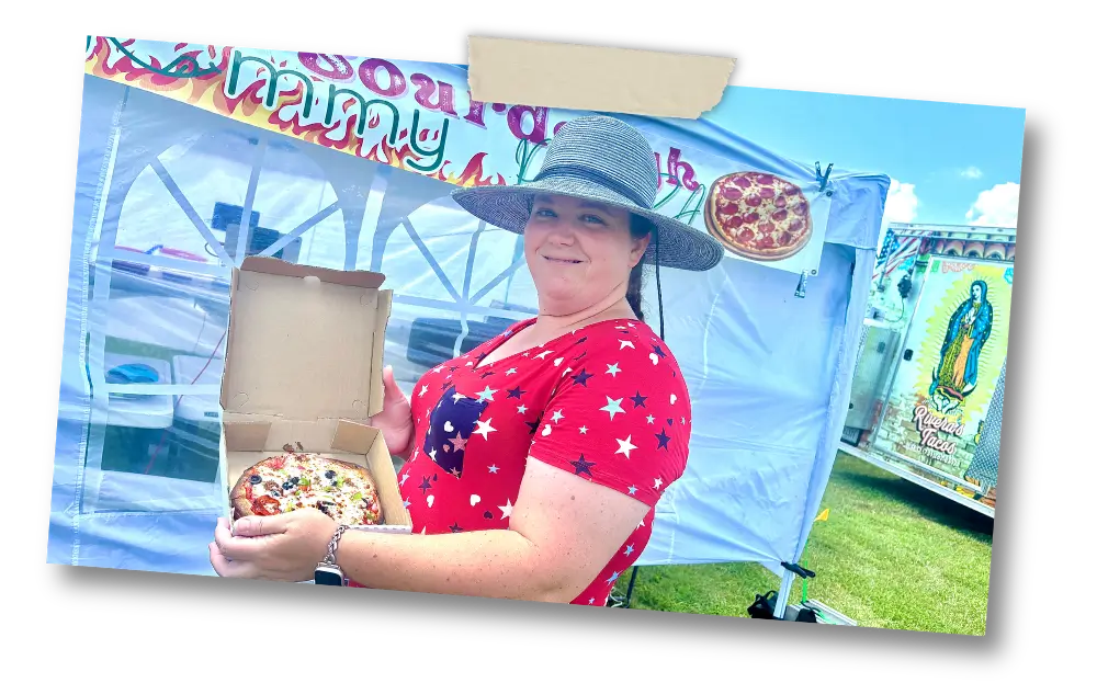 Tiffany with pizza box at fest